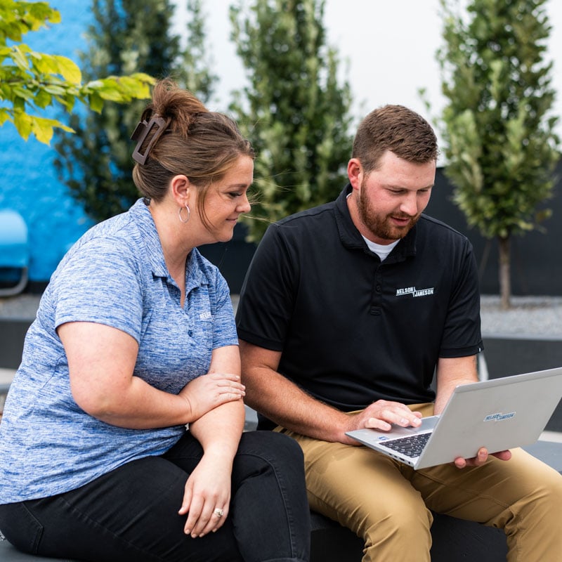 Amanda-Hilgart-Chris-Murphy-laptop-sitting-patio