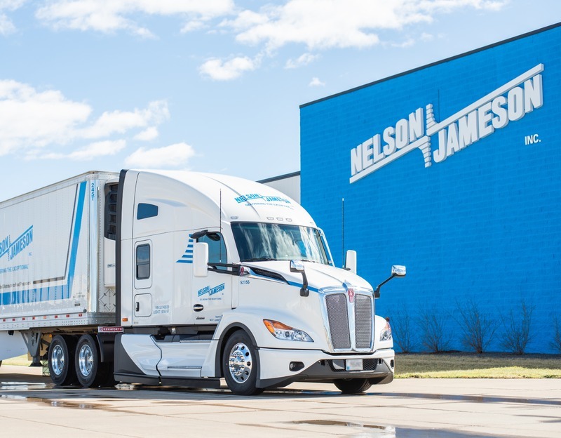 Image-Nelson-Jameson-newly-branded-cab-and-trailer-in-front-of-corporate-office-close-low-angle-1